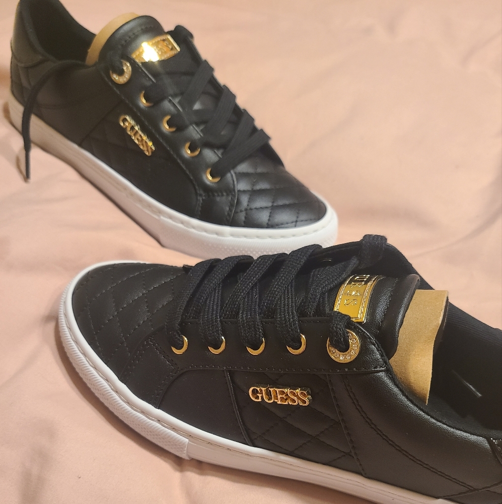 GUESS Women's Loven Sneaker Black And Gold 6.5, 7.5